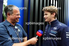 (L to R): Ted Kravitz (GBR) Sky Sports Pitlane Reporter with Logan Sargeant (USA) Williams Racing. 16.05.2024. Formula 1 World Championship, Rd 7, Emilia Romagna Grand Prix, Imola, Italy, Preparation Day.