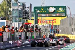 Charles Leclerc (MON) Ferrari SF-24 at the end of the queue in the pits. 30.08.2024. Formula 1 World Championship, Rd 16, Italian Grand Prix, Monza, Italy, Practice Day.