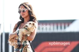 Alexandra Saint Mleux (ITA), girlfriend of Charles Leclerc (MON) Ferrari, and puppy dog Leo 30.08.2024. Formula 1 World Championship, Rd 16, Italian Grand Prix, Monza, Italy, Practice Day.