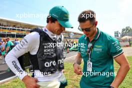 (L to R): Lance Stroll (CDN) Aston Martin F1 Team with Henry Howe (GBR) Aston Martin F1 Team Personal Trainer on the grid. 01.09.2024. Formula 1 World Championship, Rd 16, Italian Grand Prix, Monza, Italy, Race Day.