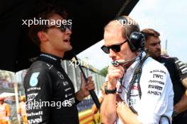 George Russell (GBR) Mercedes AMG F1 with Marcus Dudley (GBR) Mercedes AMG F1 Race Engineer on the grid. 01.09.2024. Formula 1 World Championship, Rd 16, Italian Grand Prix, Monza, Italy, Race Day.