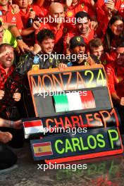 Race winner Charles Leclerc (MON) Ferrari celebrates with team mate Carlos Sainz Jr (ESP) Ferrari and the team. 01.09.2024. Formula 1 World Championship, Rd 16, Italian Grand Prix, Monza, Italy, Race Day.