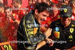 Race winner Charles Leclerc (MON) Ferrari celebrates with team mate Carlos Sainz Jr (ESP) Ferrari and the team. 01.09.2024. Formula 1 World Championship, Rd 16, Italian Grand Prix, Monza, Italy, Race Day.