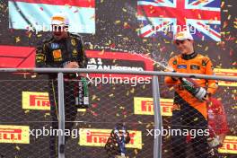 1st place Charles Leclerc (MON) Ferrari SF-24 with Oscar Piastri (AUS) McLaren MCL38. 01.09.2024. Formula 1 World Championship, Rd 16, Italian Grand Prix, Monza, Italy, Race Day.