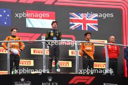 1st place Charles Leclerc (MON) Ferrari SF-24, 2nd place Oscar Piastri (AUS) McLaren MCL38, 3rd place Lando Norris (GBR) McLaren MCL38 and Diego Ioverno (ITA) Ferrari Sporting Director Ferrari. 01.09.2024. Formula 1 World Championship, Rd 16, Italian Grand Prix, Monza, Italy, Race Day.