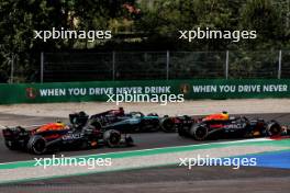 Max Verstappen (NLD) Red Bull Racing RB20 leads George Russell (GBR) Mercedes AMG F1 W15 and Sergio Perez (MEX) Red Bull Racing RB20 at the start of the race. 01.09.2024. Formula 1 World Championship, Rd 16, Italian Grand Prix, Monza, Italy, Race Day.