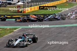 George Russell (GBR) Mercedes AMG F1 W15 runs wide at the start of the race.  01.09.2024. Formula 1 World Championship, Rd 16, Italian Grand Prix, Monza, Italy, Race Day.