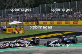 Kevin Magnussen (DEN) Haas VF-24 and Alexander Albon (THA) Williams Racing FW46 battle for position. 01.09.2024. Formula 1 World Championship, Rd 16, Italian Grand Prix, Monza, Italy, Race Day.