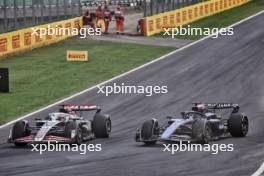 Kevin Magnussen (DEN) Haas VF-24 and Alexander Albon (THA) Williams Racing FW46 battle for position. 01.09.2024. Formula 1 World Championship, Rd 16, Italian Grand Prix, Monza, Italy, Race Day.