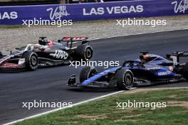 Kevin Magnussen (DEN) Haas VF-24 and Alexander Albon (THA) Williams Racing FW46 battle for position. 01.09.2024. Formula 1 World Championship, Rd 16, Italian Grand Prix, Monza, Italy, Race Day.