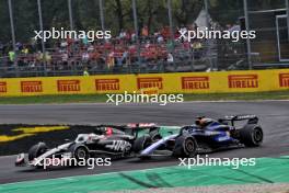 Kevin Magnussen (DEN) Haas VF-24 and Alexander Albon (THA) Williams Racing FW46 battle for position. 01.09.2024. Formula 1 World Championship, Rd 16, Italian Grand Prix, Monza, Italy, Race Day.