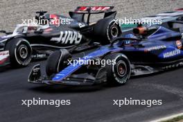 Kevin Magnussen (DEN) Haas VF-24 and Alexander Albon (THA) Williams Racing FW46 battle for position. 01.09.2024. Formula 1 World Championship, Rd 16, Italian Grand Prix, Monza, Italy, Race Day.