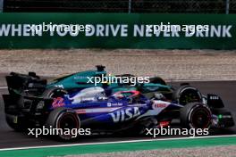 Yuki Tsunoda (JPN) RB VCARB 01 and Lance Stroll (CDN) Aston Martin F1 Team AMR24 battle for position. 01.09.2024. Formula 1 World Championship, Rd 16, Italian Grand Prix, Monza, Italy, Race Day.