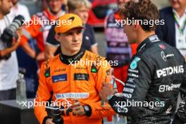 (L to R): second placed Oscar Piastri (AUS) McLaren in qualifying parc ferme with third placed George Russell (GBR) Mercedes AMG F1. 31.08.2024. Formula 1 World Championship, Rd 16, Italian Grand Prix, Monza, Italy, Qualifying Day.