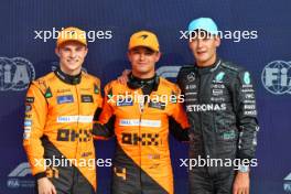 Qualifying top three in parc ferme (L to R): Oscar Piastri (AUS) McLaren, second; Lando Norris (GBR) McLaren, pole position; George Russell (GBR) Mercedes AMG F1, third. 31.08.2024. Formula 1 World Championship, Rd 16, Italian Grand Prix, Monza, Italy, Qualifying Day.