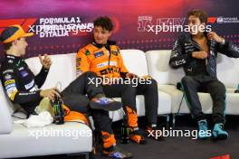 (L to R): Oscar Piastri (AUS) McLaren; Lando Norris (GBR) McLaren; and George Russell (GBR) Mercedes AMG F1, in the post qualifying FIA Press Conference. 31.08.2024. Formula 1 World Championship, Rd 16, Italian Grand Prix, Monza, Italy, Qualifying Day.