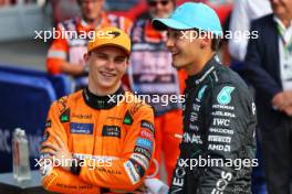 (L to R): second placed Oscar Piastri (AUS) McLaren in qualifying parc ferme with third placed George Russell (GBR) Mercedes AMG F1. 31.08.2024. Formula 1 World Championship, Rd 16, Italian Grand Prix, Monza, Italy, Qualifying Day.