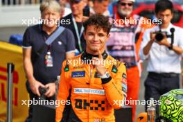 Lando Norris (GBR) McLaren celebrates his pole position in qualifying parc ferme. 31.08.2024. Formula 1 World Championship, Rd 16, Italian Grand Prix, Monza, Italy, Qualifying Day.