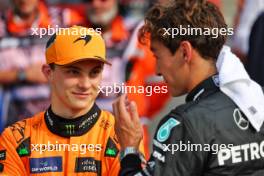 (L to R): second placed Oscar Piastri (AUS) McLaren in qualifying parc ferme with third placed George Russell (GBR) Mercedes AMG F1. 31.08.2024. Formula 1 World Championship, Rd 16, Italian Grand Prix, Monza, Italy, Qualifying Day.