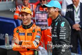 (L to R): second placed Oscar Piastri (AUS) McLaren in qualifying parc ferme with third placed George Russell (GBR) Mercedes AMG F1. 31.08.2024. Formula 1 World Championship, Rd 16, Italian Grand Prix, Monza, Italy, Qualifying Day.