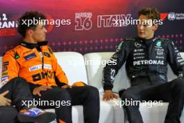 (L to R): Lando Norris (GBR) McLaren and George Russell (GBR) Mercedes AMG F1 in the post qualifying FIA Press Conference. 31.08.2024. Formula 1 World Championship, Rd 16, Italian Grand Prix, Monza, Italy, Qualifying Day.