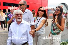 (L to R): Bernie Ecclestone (GBR) with Gerhard Berger (AUT); Fabiana Flosi (BRA); and Silvia Domenicali (ITA). 31.08.2024. Formula 1 World Championship, Rd 16, Italian Grand Prix, Monza, Italy, Qualifying Day.