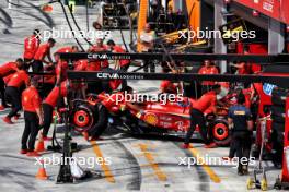 Charles Leclerc (MON) Ferrari SF-24 and Carlos Sainz Jr (ESP) Ferrari SF-24 in the pits. 31.08.2024. Formula 1 World Championship, Rd 16, Italian Grand Prix, Monza, Italy, Qualifying Day.