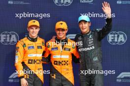 Qualifying top three in parc ferme (L to R): Oscar Piastri (AUS) McLaren, second; Lando Norris (GBR) McLaren, pole position; George Russell (GBR) Mercedes AMG F1, third. 31.08.2024. Formula 1 World Championship, Rd 16, Italian Grand Prix, Monza, Italy, Qualifying Day.