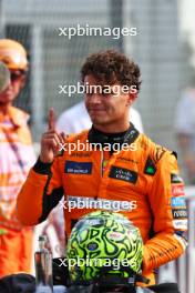 Lando Norris (GBR) McLaren celebrates his pole position in qualifying parc ferme. 31.08.2024. Formula 1 World Championship, Rd 16, Italian Grand Prix, Monza, Italy, Qualifying Day.