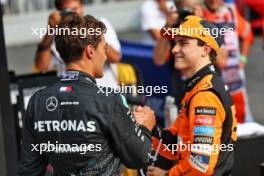 (L to R): Pole sitter Lando Norris (GBR) McLaren in qualifying parc ferme third placed George Russell (GBR) Mercedes AMG F1. 31.08.2024. Formula 1 World Championship, Rd 16, Italian Grand Prix, Monza, Italy, Qualifying Day.