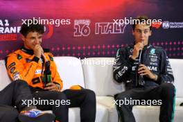 (L to R): Lando Norris (GBR) McLaren and George Russell (GBR) Mercedes AMG F1 in the post qualifying FIA Press Conference. 31.08.2024. Formula 1 World Championship, Rd 16, Italian Grand Prix, Monza, Italy, Qualifying Day.