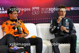 (L to R): Lando Norris (GBR) McLaren and George Russell (GBR) Mercedes AMG F1 in the post qualifying FIA Press Conference. 31.08.2024. Formula 1 World Championship, Rd 16, Italian Grand Prix, Monza, Italy, Qualifying Day.