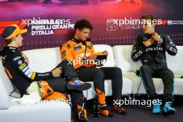 (L to R): Oscar Piastri (AUS) McLaren; Lando Norris (GBR) McLaren; and George Russell (GBR) Mercedes AMG F1, in the post qualifying FIA Press Conference. 31.08.2024. Formula 1 World Championship, Rd 16, Italian Grand Prix, Monza, Italy, Qualifying Day.