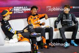 (L to R): Oscar Piastri (AUS) McLaren; Lando Norris (GBR) McLaren; and George Russell (GBR) Mercedes AMG F1, in the post qualifying FIA Press Conference. 31.08.2024. Formula 1 World Championship, Rd 16, Italian Grand Prix, Monza, Italy, Qualifying Day.