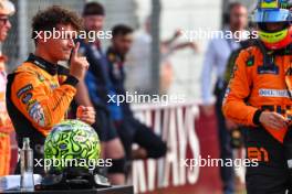 Lando Norris (GBR) McLaren celebrates his pole position in qualifying parc ferme. 31.08.2024. Formula 1 World Championship, Rd 16, Italian Grand Prix, Monza, Italy, Qualifying Day.