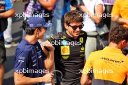 (L to R): Alexander Albon (THA) Williams Racing FW46; Charles Leclerc (MON) Ferrari; and Lando Norris (GBR) McLaren, on the drivers' parade. 01.09.2024. Formula 1 World Championship, Rd 16, Italian Grand Prix, Monza, Italy, Race Day.