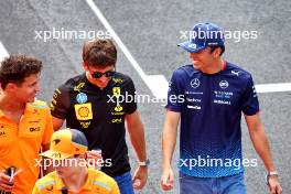 (L to R): Lando Norris (GBR) McLaren; Charles Leclerc (MON) Ferrari; and Alexander Albon (THA) Williams Racing on the drivers' parade. 01.09.2024. Formula 1 World Championship, Rd 16, Italian Grand Prix, Monza, Italy, Race Day.