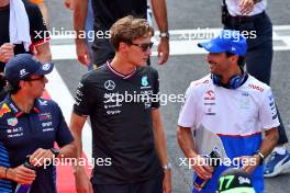 (L to R): George Russell (GBR) Mercedes AMG F1 with Daniel Ricciardo (AUS) RB on the drivers' parade. 01.09.2024. Formula 1 World Championship, Rd 16, Italian Grand Prix, Monza, Italy, Race Day.