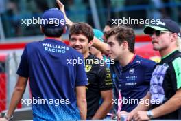 Charles Leclerc (MON) Ferrari with Franco Colapinto (ARG) Williams Racing and Alexander Albon (THA) Williams Racing on the drivers' parade. 01.09.2024. Formula 1 World Championship, Rd 16, Italian Grand Prix, Monza, Italy, Race Day.