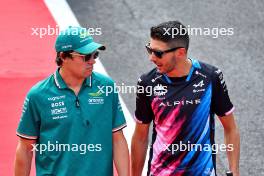 (L to R): Lance Stroll (CDN) Aston Martin F1 Team with Esteban Ocon (FRA) Alpine F1 Team on the drivers' parade. 01.09.2024. Formula 1 World Championship, Rd 16, Italian Grand Prix, Monza, Italy, Race Day.