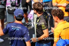 (L to R): Alexander Albon (THA) Williams Racing FW46; Charles Leclerc (MON) Ferrari; and Lando Norris (GBR) McLaren, on the drivers' parade. 01.09.2024. Formula 1 World Championship, Rd 16, Italian Grand Prix, Monza, Italy, Race Day.