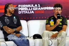 (L to R): Lewis Hamilton (GBR) Mercedes AMG F1 and Charles Leclerc (MON) Ferrari in the FIA Press Conference. 29.08.2024. Formula 1 World Championship, Rd 16, Italian Grand Prix, Monza, Italy, Preparation Day.