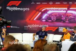 (L to R): Sergio Perez (MEX) Red Bull Racing; Alexander Albon (THA) Williams Racing; and Lando Norris (GBR) McLaren, in the FIA Press Conference. 29.08.2024. Formula 1 World Championship, Rd 16, Italian Grand Prix, Monza, Italy, Preparation Day.