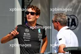 (L to R): George Russell (GBR) Mercedes AMG F1 with Bernd Maylander (GER) FIA Safety Car Driver. 29.08.2024. Formula 1 World Championship, Rd 16, Italian Grand Prix, Monza, Italy, Preparation Day.