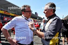 (L to R): Nicholas Tombazis (GRE) FIA Head of Single-Seater Technical Matters with Mario Isola (ITA) Pirelli Racing Manager on the grid. 07.04.2024. Formula 1 World Championship, Rd 4, Japanese Grand Prix, Suzuka, Japan, Race Day.
