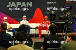 (L to R): Sergio Perez (MEX) Red Bull Racing; Max Verstappen (NLD) Red Bull Racing; and Carlos Sainz Jr (ESP) Ferrari, in the post race FIA Press Conference. 07.04.2024. Formula 1 World Championship, Rd 4, Japanese Grand Prix, Suzuka, Japan, Race Day.