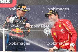 1st place Max Verstappen (NLD) Red Bull Racing RB20 and 3rd place Carlos Sainz Jr (ESP) Ferrari. 07.04.2024. Formula 1 World Championship, Rd 4, Japanese Grand Prix, Suzuka, Japan, Race Day.