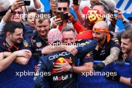 Race winner Max Verstappen (NLD) Red Bull Racing celebrates with Christian Horner (GBR) Red Bull Racing Team Principal and the team in parc ferme. 07.04.2024. Formula 1 World Championship, Rd 4, Japanese Grand Prix, Suzuka, Japan, Race Day.