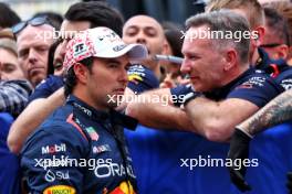 Second placed Sergio Perez (MEX) Red Bull Racing in parc ferme with Christian Horner (GBR) Red Bull Racing Team Principal. 07.04.2024. Formula 1 World Championship, Rd 4, Japanese Grand Prix, Suzuka, Japan, Race Day.