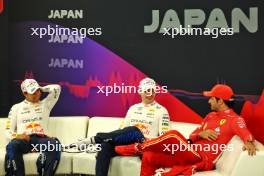(L to R): Sergio Perez (MEX) Red Bull Racing; Max Verstappen (NLD) Red Bull Racing; and Carlos Sainz Jr (ESP) Ferrari, in the post race FIA Press Conference. 07.04.2024. Formula 1 World Championship, Rd 4, Japanese Grand Prix, Suzuka, Japan, Race Day.